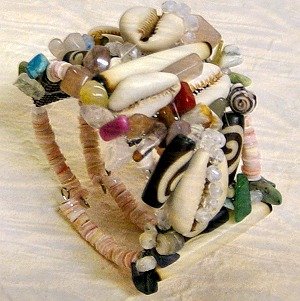 fai da te braccialetto etnico basi forate e fili armonici conchiglie perle legno pietre semipreziose cristalli