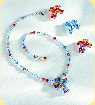 fare Croci Swarovski bomboniere e bijoux collana fai da te cristalli azzurri multicolore
