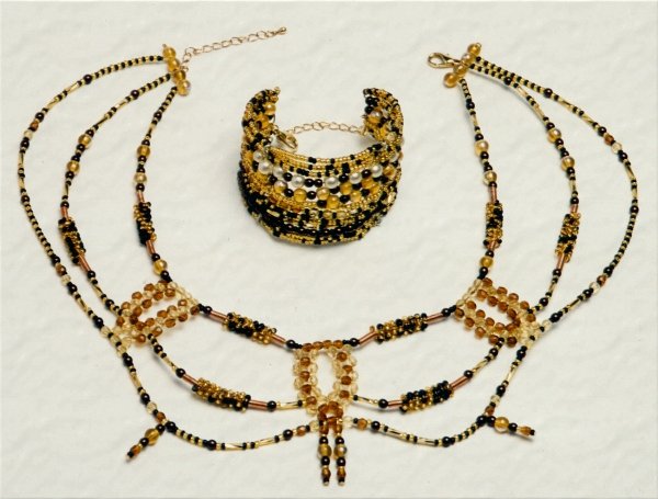 collana perline topazio ambra nero braccialetto con catenella motivo foglie