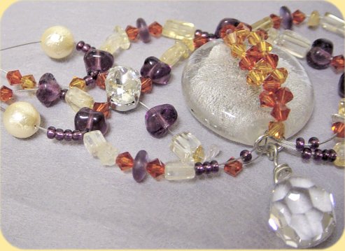 intrecciare perline cristalli Swarovski strass pietre semipreziose per creare collane fai da te perle arancione viola