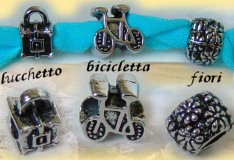 esempio creazione con nastro elastan tiramolla fettuccia elastica per charms perle stile pandora lucchetto bicicletta fiori soggetti charms perle bigiotteria e bomboniere fai da te bracciali pandora con fettuccia