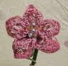 fiore rosa di nastro reticolato per composizioni e bomboniere