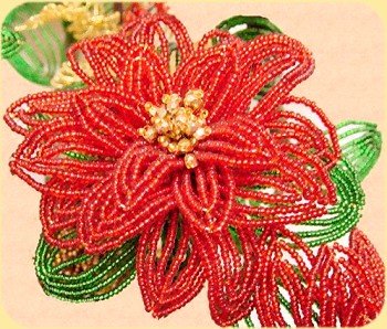 esempio di stella di Natale realizzata con le tecniche veneziane dei fiori di perline